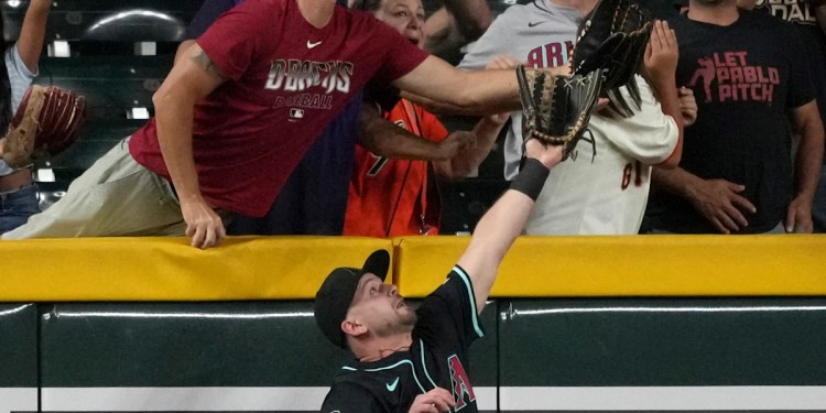 Diamondbacks fan removed from win over Giants after controversial interference review Diamondbacks fan removed from win over Giants after controversial interference review