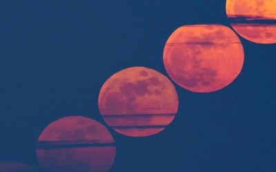 The March full moon glows red through Saharan dust in eerie composite view The March full moon glows red through Saharan dust in eerie composite view