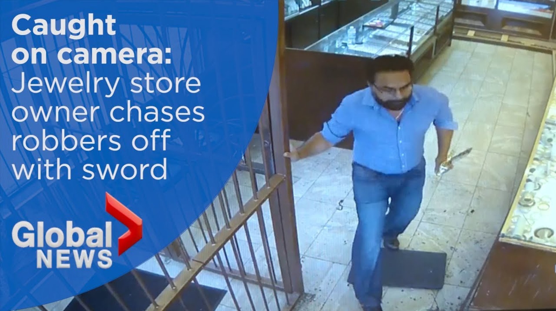 Jewelry store owner chases robbery suspects off with sword Jewelry store owner chases robbery suspects off with sword
