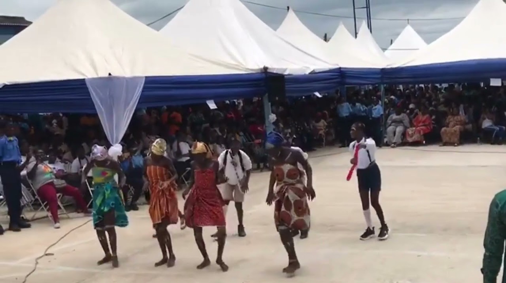 Ghanaian students perform a 'Kpanlogo' dance for their school's 15th anniversary Ghanaian students perform a 'Kpanlogo' dance for their school's 15th anniversary