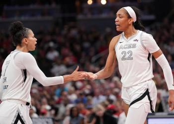 A’ja Wilson got her flowers from teammate Alysha Clark during a tearful Aces postgame presser A’ja Wilson got her flowers from teammate Alysha Clark during a tearful Aces postgame presser