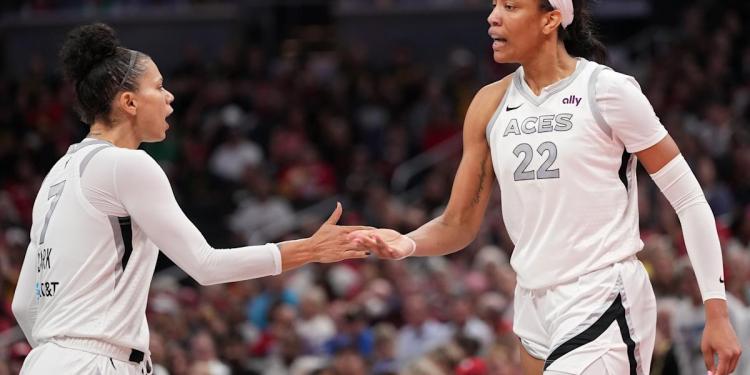 A’ja Wilson got her flowers from teammate Alysha Clark during a tearful Aces postgame presser A’ja Wilson got her flowers from teammate Alysha Clark during a tearful Aces postgame presser