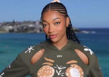 Angel Reese Nails Mob Wife Chic in Roberto Cavalli Dress Held up by Strings Angel Reese Nails Mob Wife Chic in Roberto Cavalli Dress Held up by Strings