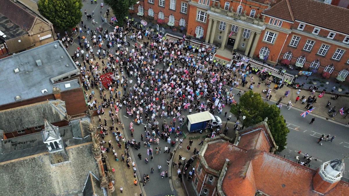 Anti-migrant protestors collect in Nuneaton over alleged rape of 12yo woman Anti-migrant protestors collect in Nuneaton over alleged rape of 12yo woman
