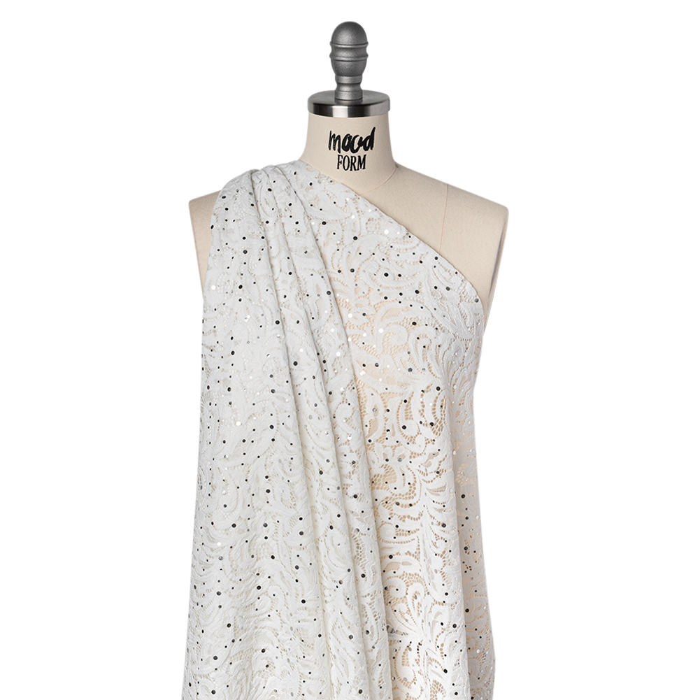 Stretch Raschel Lace with Metallic Spots – Silver and Ivory Fancy Leaves and Flowers Stretch Raschel Lace with Metallic Spots – Silver and Ivory Fancy Leaves and Flowers