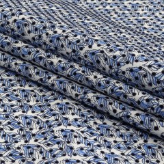 Black Flocked Polka Dots on Blue and White Leaves Stretch Cotton Shirting Black Flocked Polka Dots on Blue and White Leaves Stretch Cotton Shirting