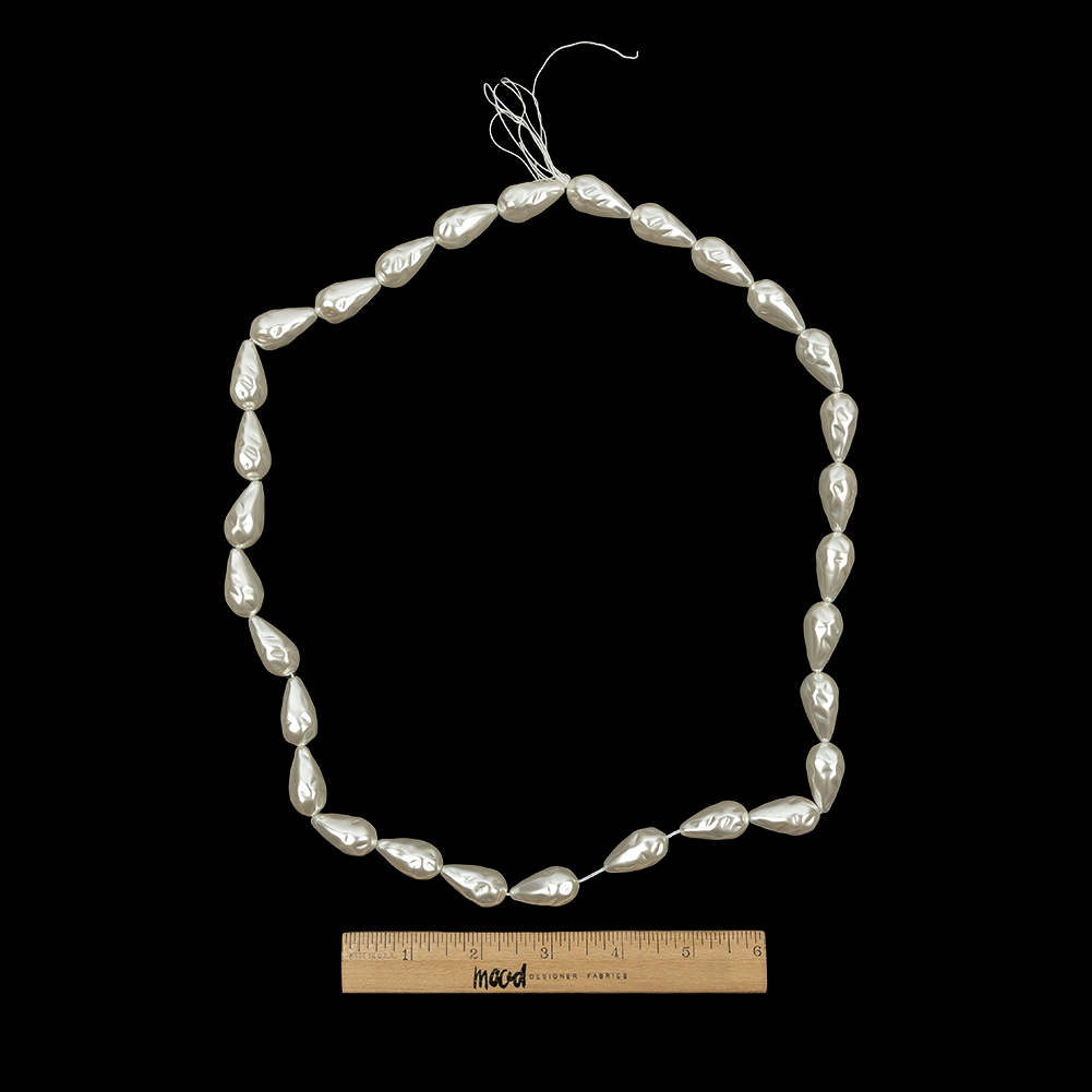 Vintage Faux Pearl Teardrop Beads Strand – 1″ x 0.5″ Vintage Faux Pearl Teardrop Beads Strand – 1″ x 0.5″