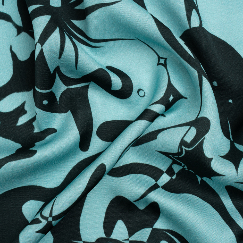 Sustainable and Recycled Viscose Satin Print – Sky Blue and Black Abstract and Stars – Mood Exclusive Cosmic Chaos Sustainable and Recycled Viscose Satin Print – Sky Blue and Black Abstract and Stars – Mood Exclusive Cosmic Chaos