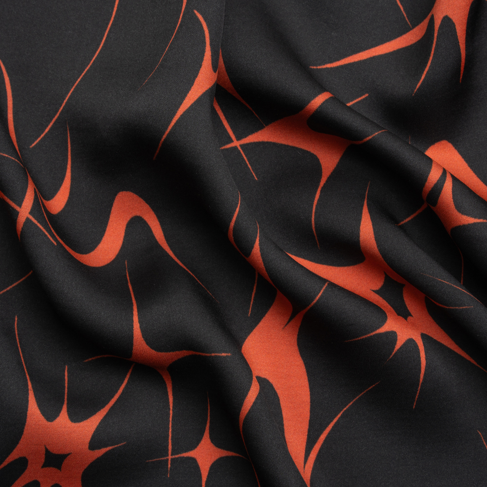 Sustainable and Recycled Viscose Satin Print – Black and Red Abstracting Stars – Mood Exclusive Speed of Light Sustainable and Recycled Viscose Satin Print – Black and Red Abstracting Stars – Mood Exclusive Speed of Light