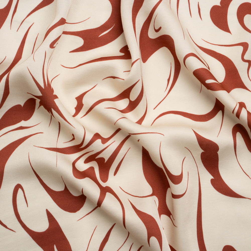 Sustainable and Recycled Viscose Satin Print – Red and Cream Swirls and Stars – Mood Exclusive Vincent’s Hope Sustainable and Recycled Viscose Satin Print – Red and Cream Swirls and Stars – Mood Exclusive Vincent’s Hope