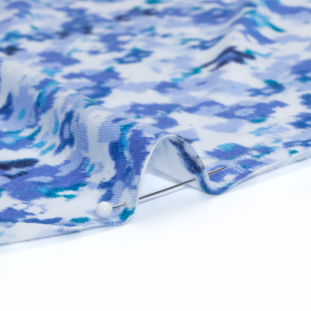 Stretch Rayon Jersey – Blue and White Ikat Ditsy Floral Stretch Rayon Jersey – Blue and White Ikat Ditsy Floral