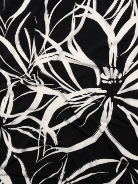 Stretch Polyester Tricot – Black and White Flowers and Leaves – Designer Deadstock Stretch Polyester Tricot – Black and White Flowers and Leaves – Designer Deadstock