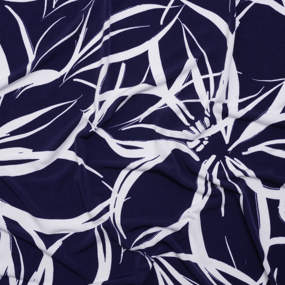 Stretch Polyester Tricot – Navy Blue and White Flowers and Leaves – Designer Deadstock Stretch Polyester Tricot – Navy Blue and White Flowers and Leaves – Designer Deadstock