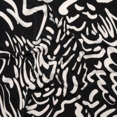 Stretch Polyester Tricot – Black and White Abstract Doodles – Designer Deadstock Stretch Polyester Tricot – Black and White Abstract Doodles – Designer Deadstock