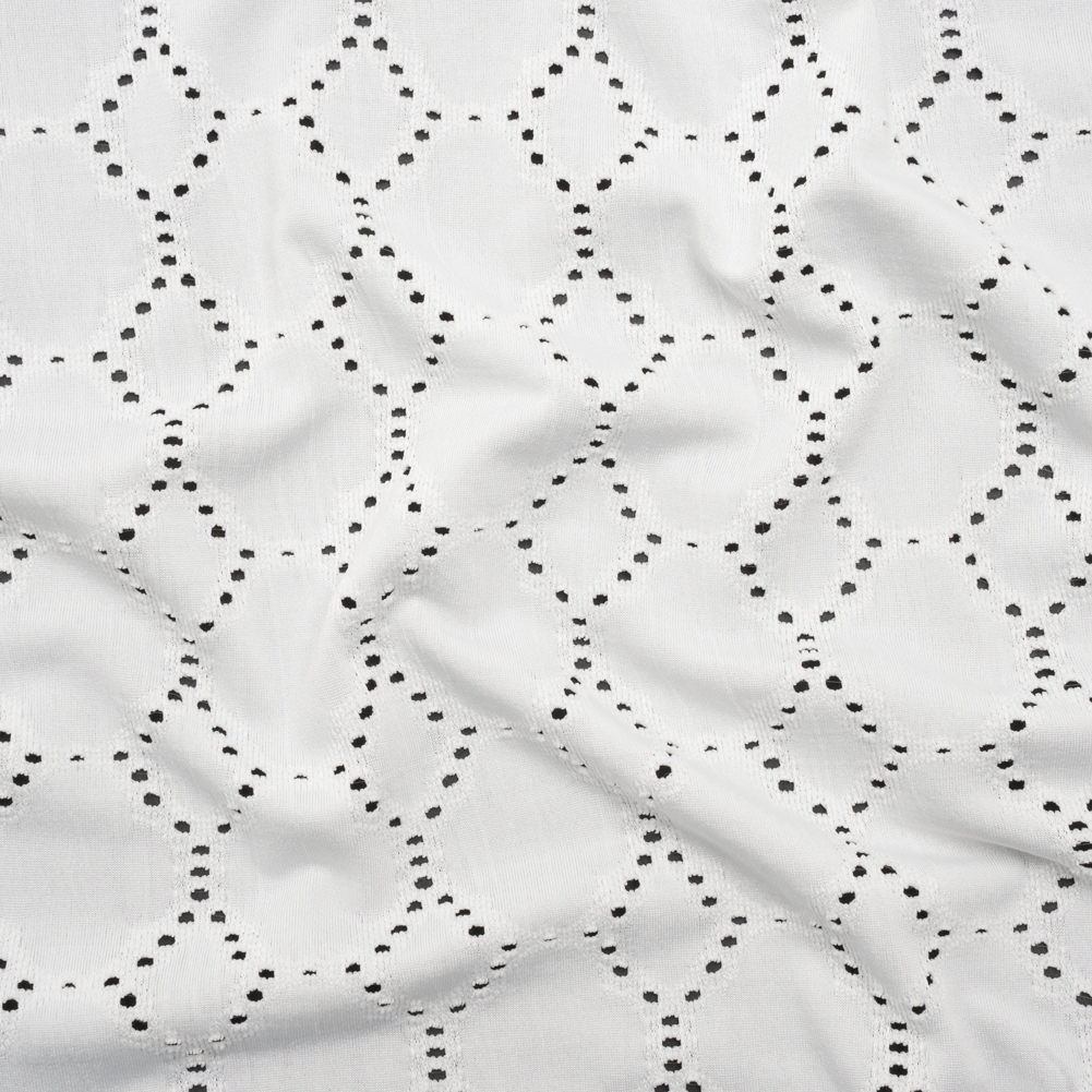 Stretch Polyester Jersey with Eyelets – White Circles – Designer Deadstock Stretch Polyester Jersey with Eyelets – White Circles – Designer Deadstock