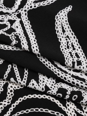 Stretch Polyester Tricot – Black and White Chain Stitch Flowers – Designer Deadstock Stretch Polyester Tricot – Black and White Chain Stitch Flowers – Designer Deadstock