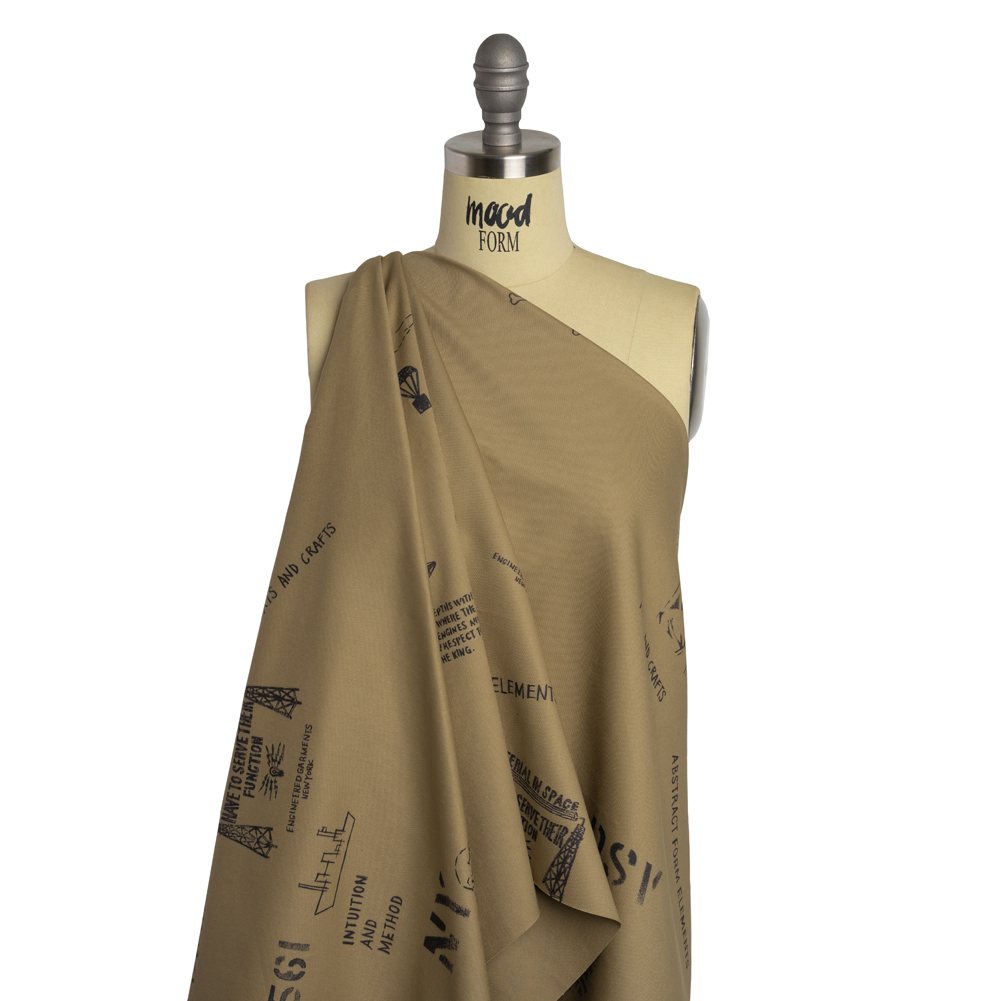 Cotton Twill Print – Khaki and Black Sketches and Stencils – Deadstock Cotton Twill Print – Khaki and Black Sketches and Stencils – Deadstock