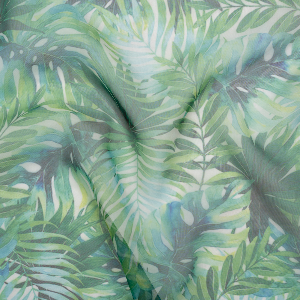 Polyester and Viscose Organza – Green and Sky Blue Topical Leaves Polyester and Viscose Organza – Green and Sky Blue Topical Leaves