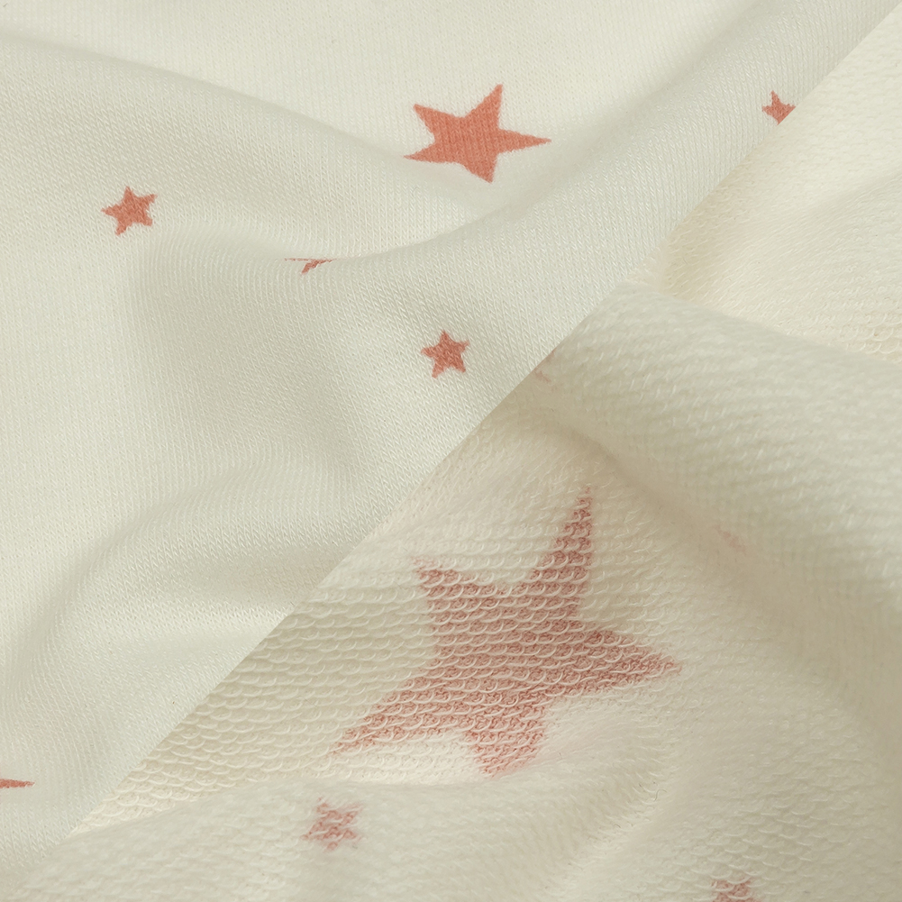 Cloud Dancer and Coral Almond Stars Stretch Polyester and Rayon French Terry