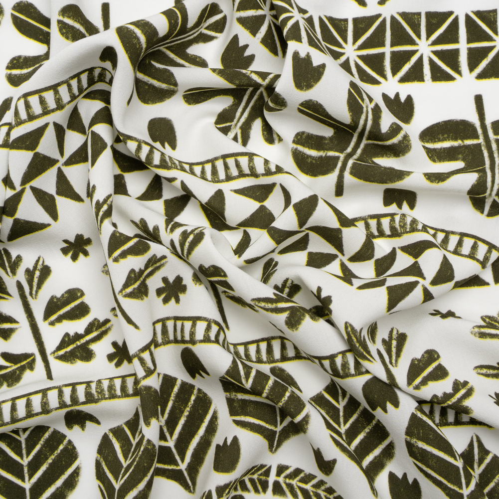 Viscose Woven Print – Olive Green and White Animal, Leaf, and Geometric Stripes – Mood Exclusive Puma Pounce Viscose Woven Print – Olive Green and White Animal, Leaf, and Geometric Stripes – Mood Exclusive Puma Pounce