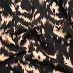 Stretch Polyester Woven Print – Black Floral Ikat – Mood Exclusive Flowers and Felines Stretch Polyester Woven Print – Black Floral Ikat – Mood Exclusive Flowers and Felines