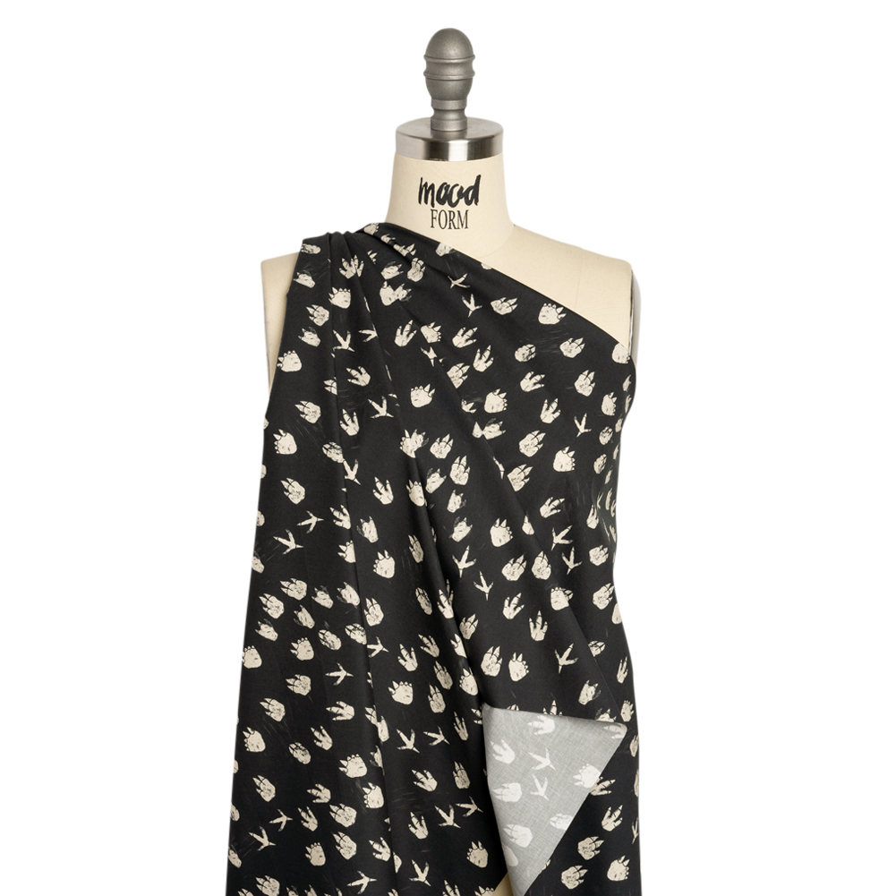 Stretch Cotton Poplin Print – Black Dinosaur Footprints – Mood Exclusive Jurassic Jubilee Stretch Cotton Poplin Print – Black Dinosaur Footprints – Mood Exclusive Jurassic Jubilee