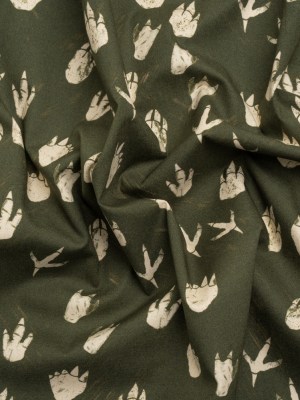 Stretch Cotton Poplin Print – Dark Olive Dinosaur Footprints – Mood Exclusive Jurassic Jubilee Stretch Cotton Poplin Print – Dark Olive Dinosaur Footprints – Mood Exclusive Jurassic Jubilee