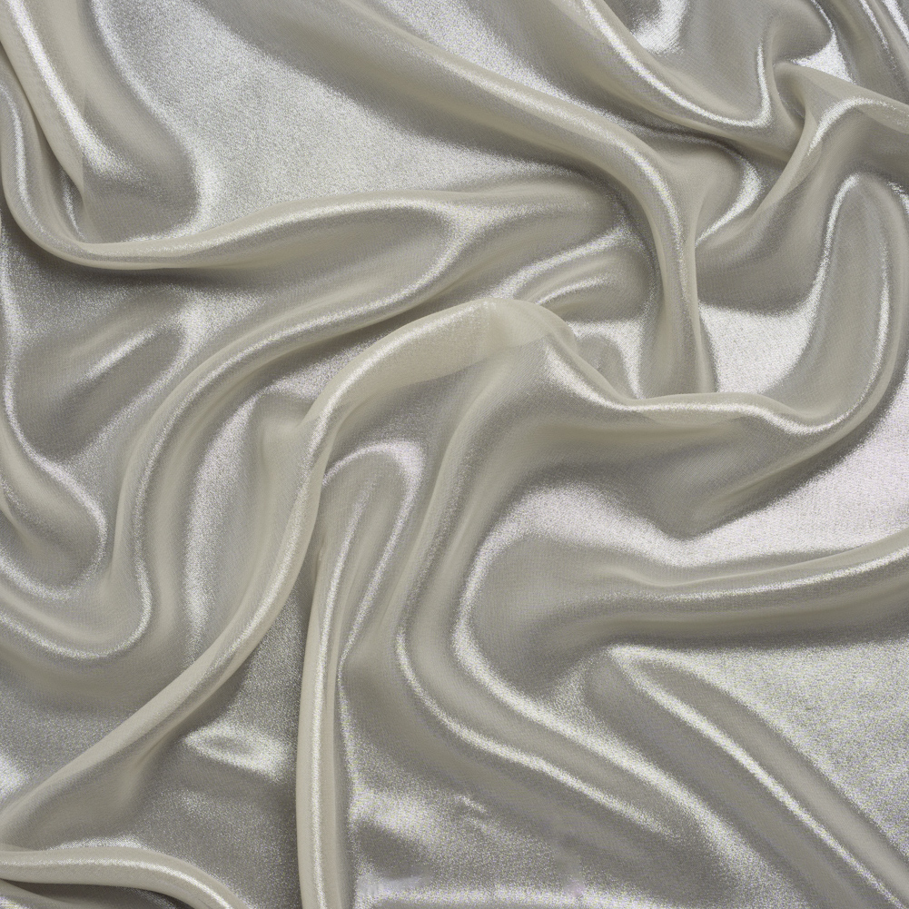 Liquid Sheen Metallic Polyester Chiffon – Silver on Beige – Liquid Sheen Chiffon Collection Liquid Sheen Metallic Polyester Chiffon – Silver on Beige – Liquid Sheen Chiffon Collection