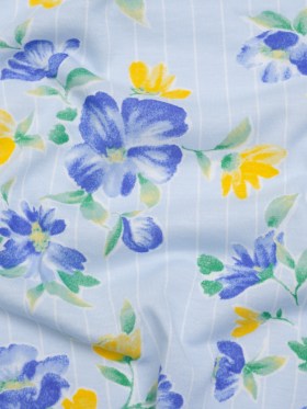 Cotton and Viscose Jersey Print – Light Blue, Yellow and Cobalt Flowers over Stripes – Deadstock Cotton and Viscose Jersey Print – Light Blue, Yellow and Cobalt Flowers over Stripes – Deadstock