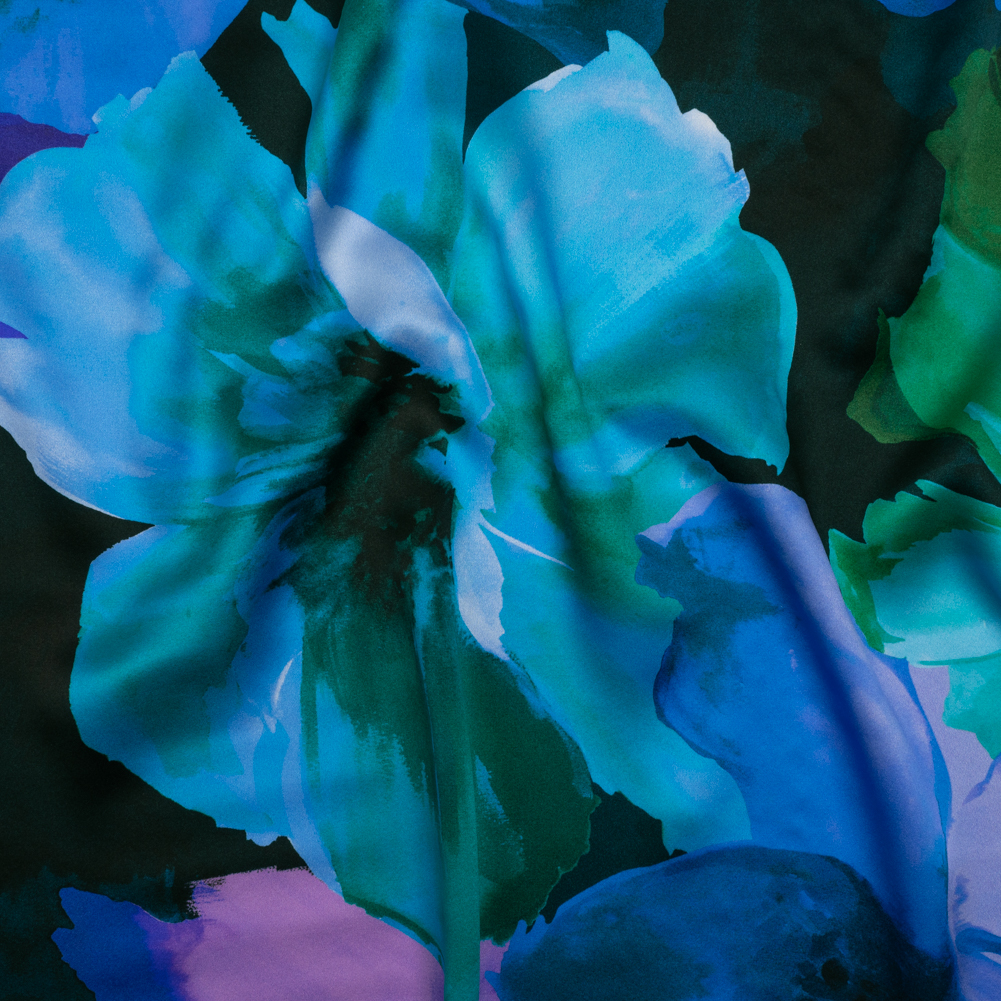 Silk Charmeuse Print 16MM, Made in Italy – Ocean Blue, Lavender, and Dark Green Painterly Flowers Silk Charmeuse Print 16MM, Made in Italy – Ocean Blue, Lavender, and Dark Green Painterly Flowers