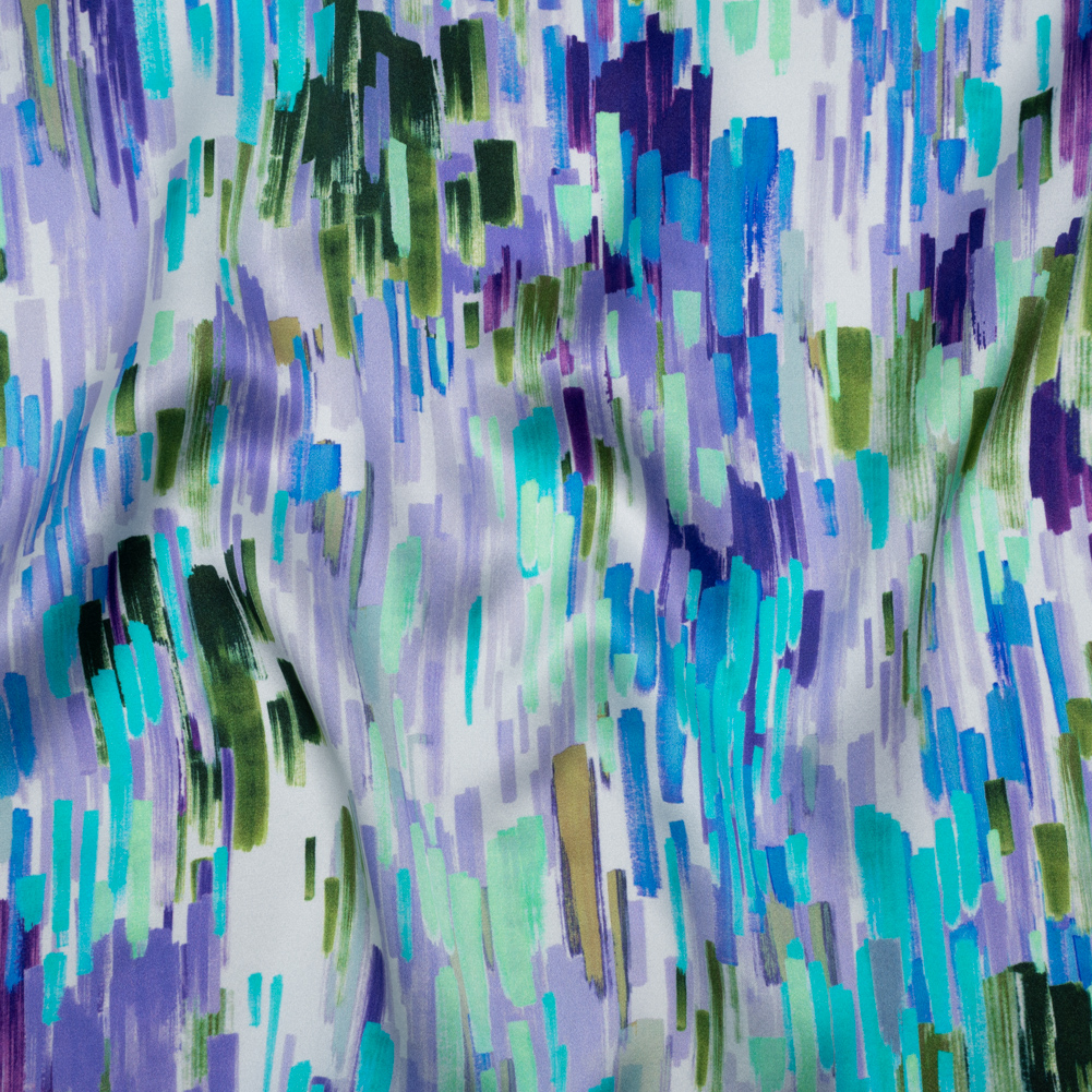 Silk Charmeuse Print 16MM, Made in Italy – Lavender, Blue and Green Painted Striations Silk Charmeuse Print 16MM, Made in Italy – Lavender, Blue and Green Painted Striations