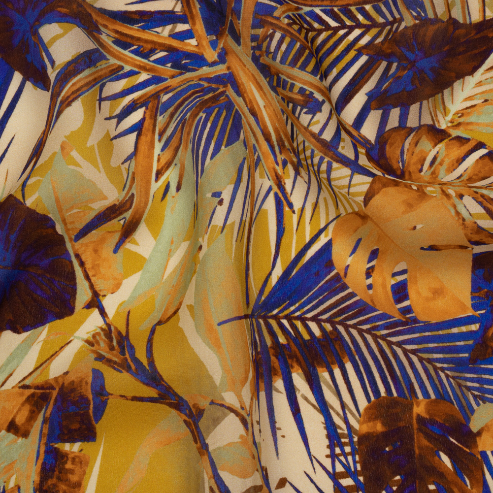 Satin Faced Silk Chiffon Print Made in Italy – Gold, Brown and Ultramarine Blue Palms and Tropical Leaves – Deadstock Satin Faced Silk Chiffon Print Made in Italy – Gold, Brown and Ultramarine Blue Palms and Tropical Leaves – Deadstock