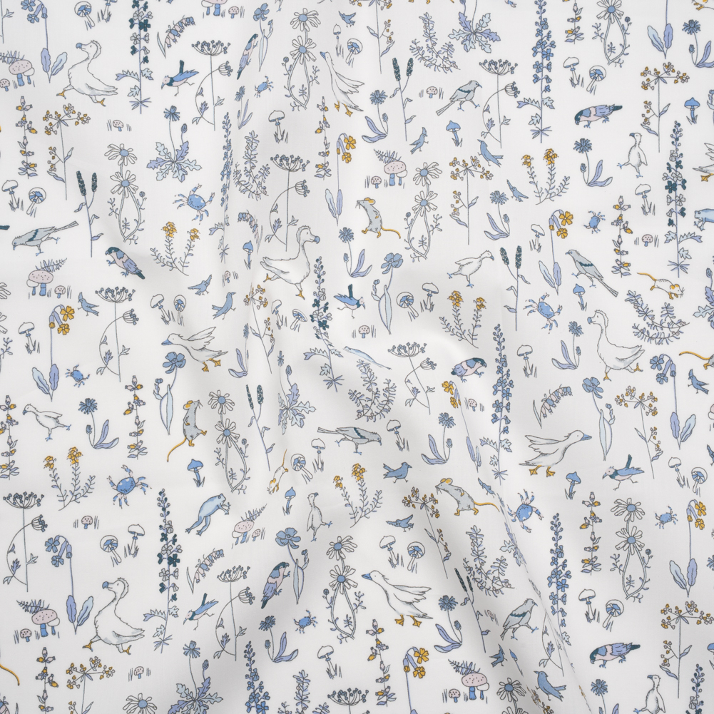 Liberty Fabrics Tana Lawn® – Theo Blue – Baby Blue, Yellow and White Cartoon Creatures and Flowers Liberty Fabrics Tana Lawn® – Theo Blue – Baby Blue, Yellow and White Cartoon Creatures and Flowers