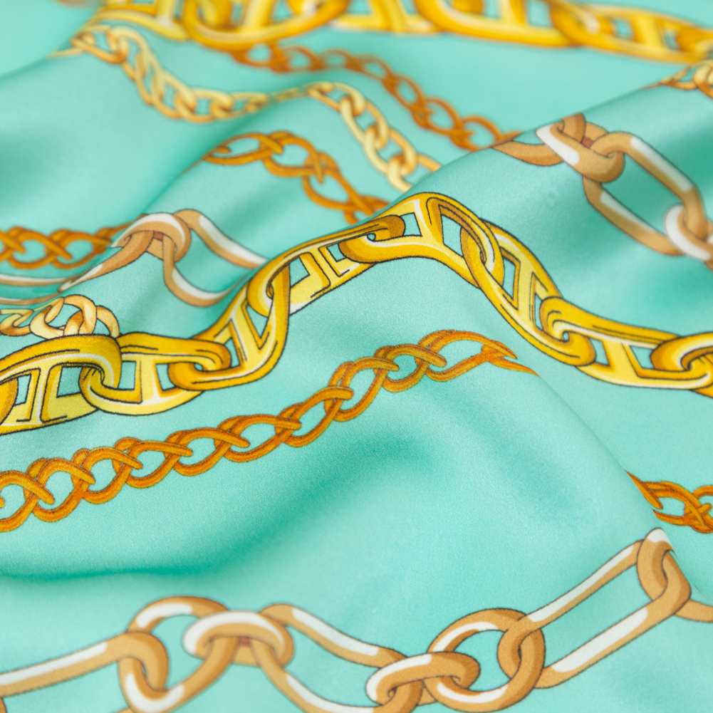 Mood Exclusive Italian Teal and Gold Chains Digitally Printed Silk Charmeuse Mood Exclusive Italian Teal and Gold Chains Digitally Printed Silk Charmeuse