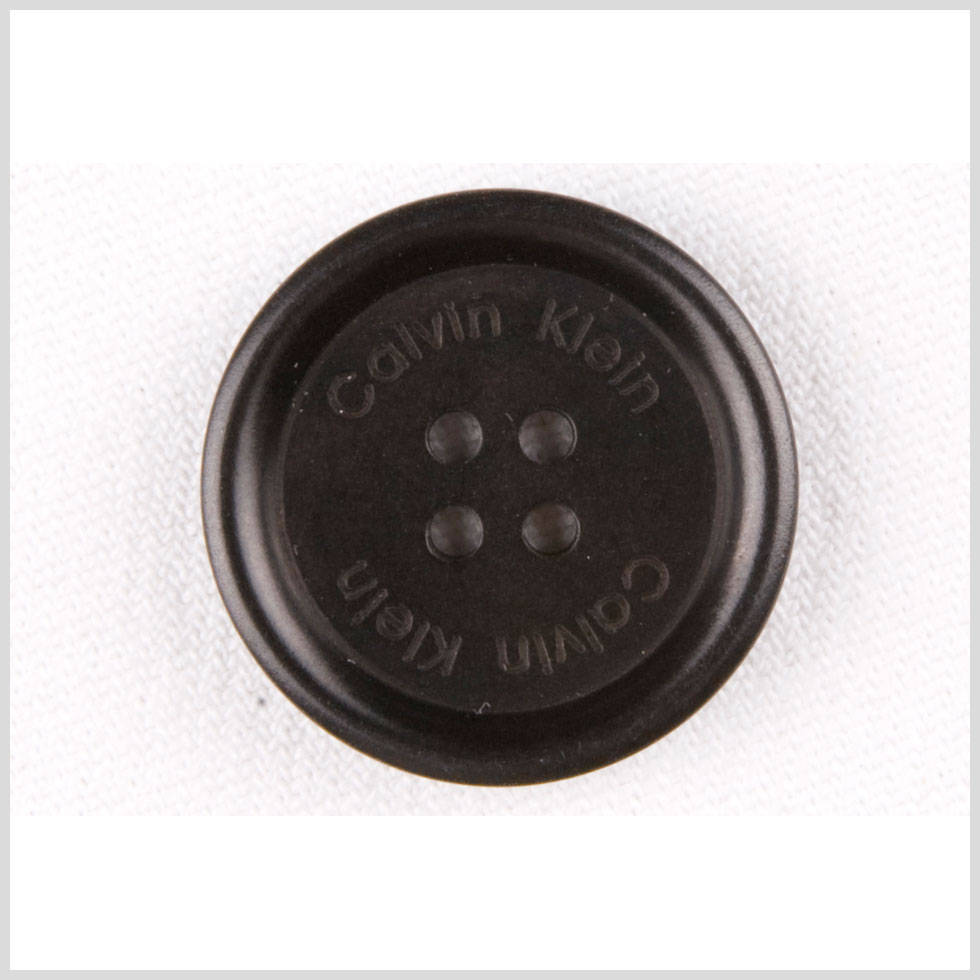 Plastic 4-Hole Button by Calvin Klein – 40L/25.5mm – Black Designer Logo Rolled Rim Plastic 4-Hole Button by Calvin Klein – 40L/25.5mm – Black Designer Logo Rolled Rim
