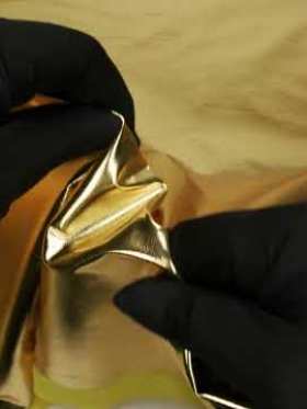 Metallic Foiled Polyester Jersey Knit – Gold – Amalthea Collection Metallic Foiled Polyester Jersey Knit – Gold – Amalthea Collection