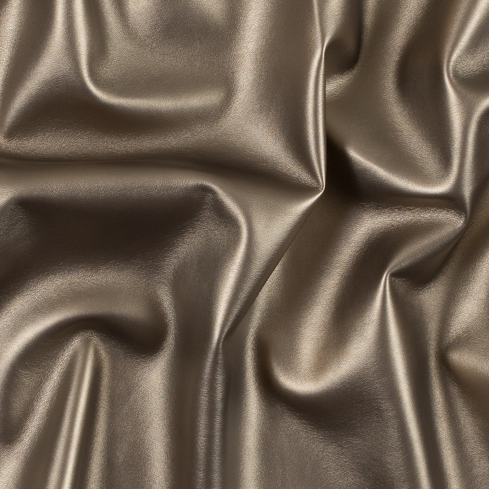 Metallic Gold Faux Leather with a Gray Faux Suede Backing Metallic Gold Faux Leather with a Gray Faux Suede Backing