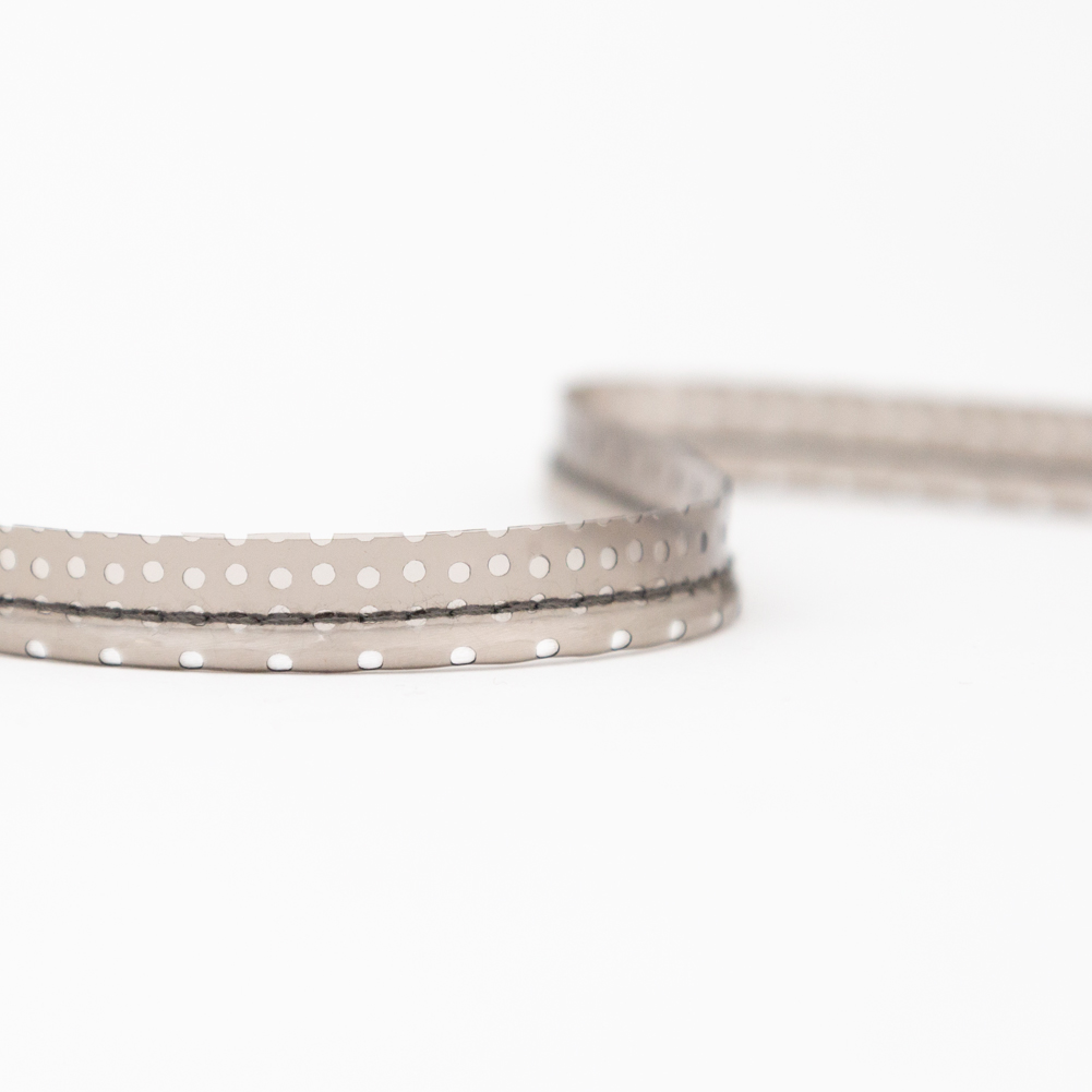 Italian White Rattail Piping with Black Perforated Plastic Casing and Lip – 0.375″ Italian White Rattail Piping with Black Perforated Plastic Casing and Lip – 0.375″