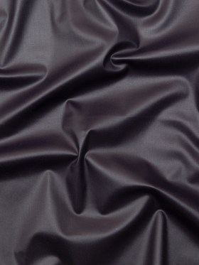 Italian Indigo Stretch Cotton Twill with a Waxy Laminate Italian Indigo Stretch Cotton Twill with a Waxy Laminate