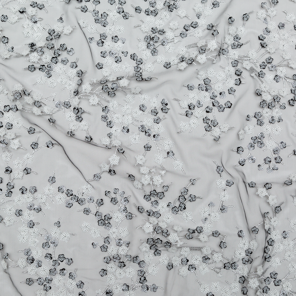 Stretch Net with Sequins – White Fancy Floral Clusters on Black Stretch Net with Sequins – White Fancy Floral Clusters on Black