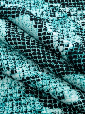 Compression Swimwear Tricot, UV Protective with Aloe Vera Microcapsules – Turquoise Python – Caye Collection Compression Swimwear Tricot, UV Protective with Aloe Vera Microcapsules – Turquoise Python – Caye Collection