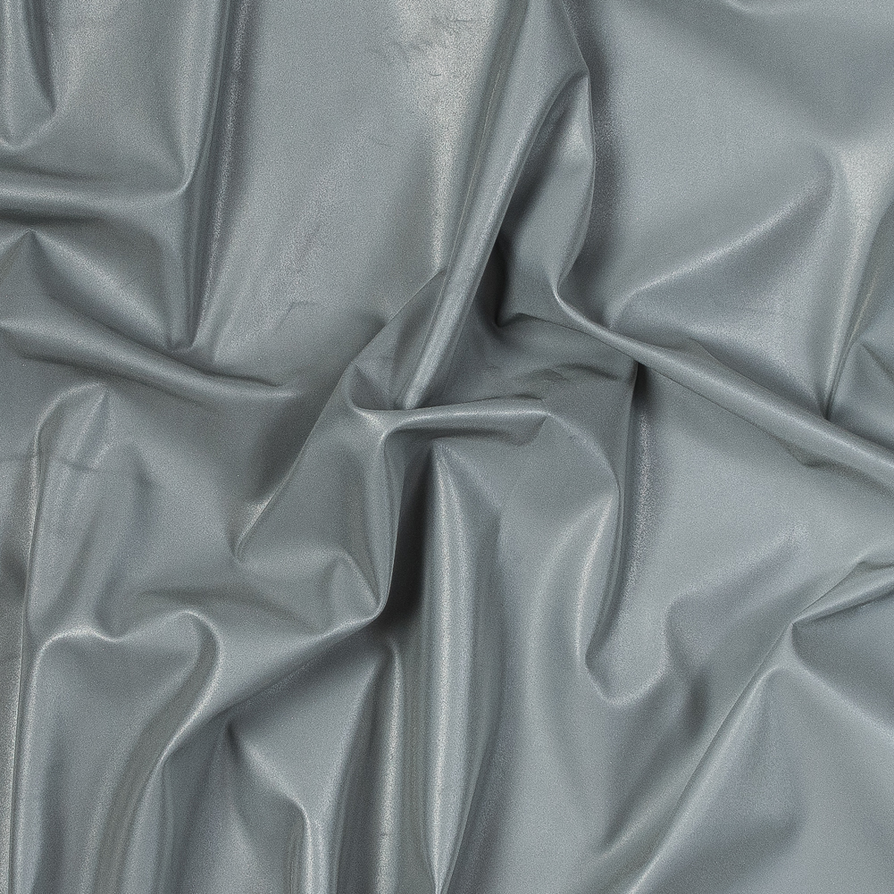 Silver Stretch Knit Reflective Fabric with White Backside Silver Stretch Knit Reflective Fabric with White Backside