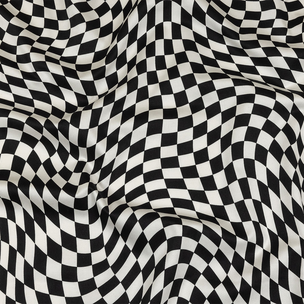 Stretch Cotton Sateen – Black and White Warped Checks – Down the Rabbit Hole Print – Mood Exclusive Indigo Collection Stretch Cotton Sateen – Black and White Warped Checks – Down the Rabbit Hole Print – Mood Exclusive Indigo Collection