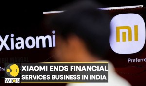 Xiaomi kehilangan pangsa pasar smartphone di India akibat regulasi dan persaingan ketat.@WION Xiaomi kehilangan pangsa pasar smartphone di India akibat regulasi dan persaingan ketat.@WION