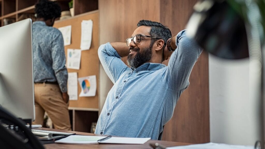 relax at work | Easy Affiliate man relaxing at work