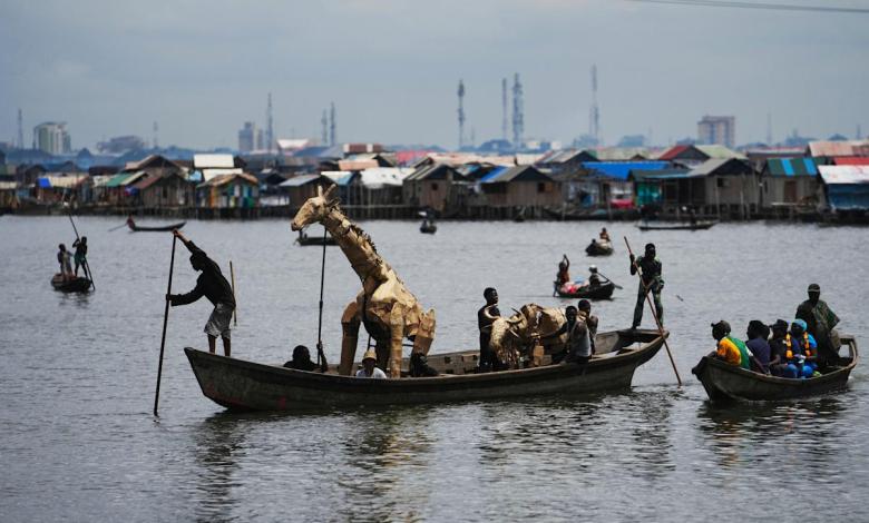 In Nigeria's floating slums, the focus of the “Herd” journey is climate change. In Nigeria's floating slums, the focus of the “Herd” journey is climate change.