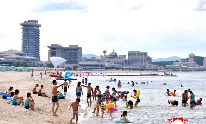 North Koreans swim and play in a touted beach resort to promote tourism North Koreans swim and play in a touted beach resort to promote tourism
