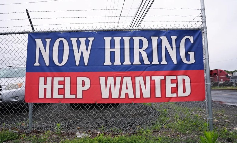 Americans seek less unemployment benefits as layoffs remain low Americans seek less unemployment benefits as layoffs remain low
