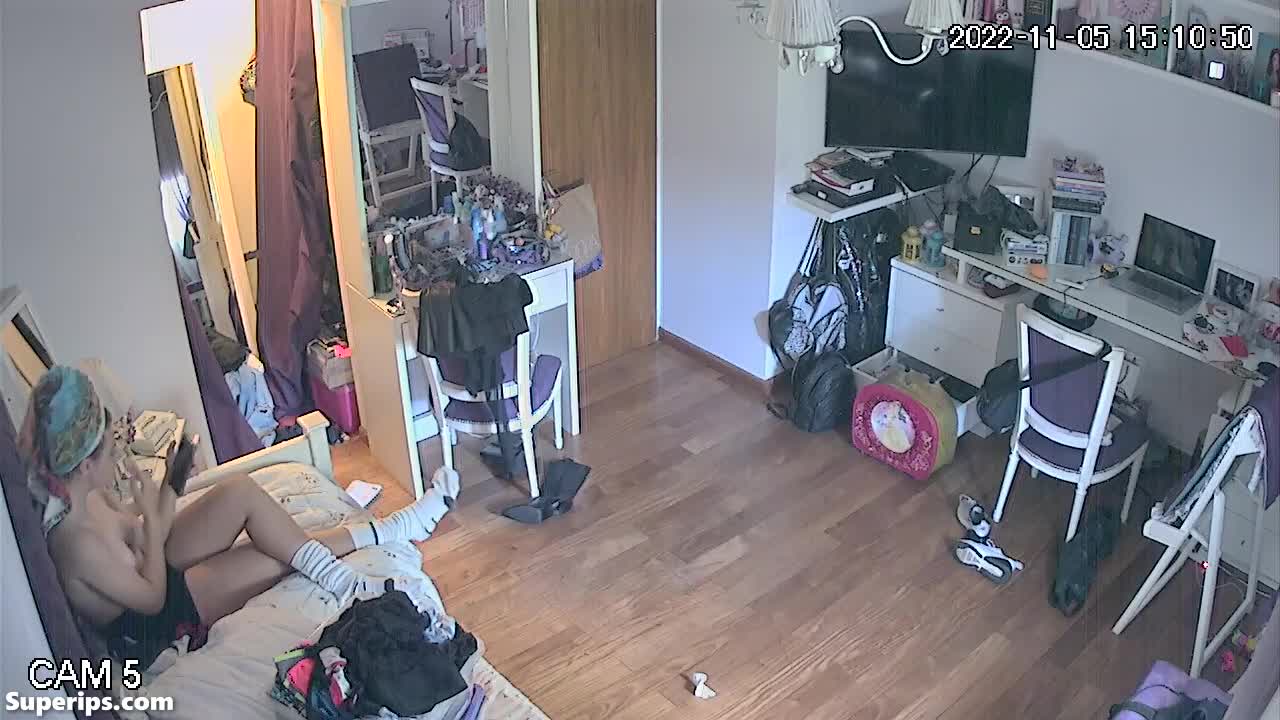 IPCAM – Redhead teen girl topless in her room IPCAM – Redhead teen girl topless in her room