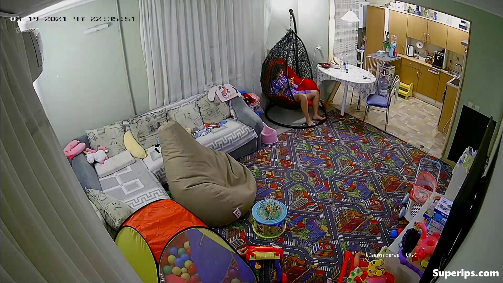 IPCAM – European girl gets dressed in the living room IPCAM – European girl gets dressed in the living room